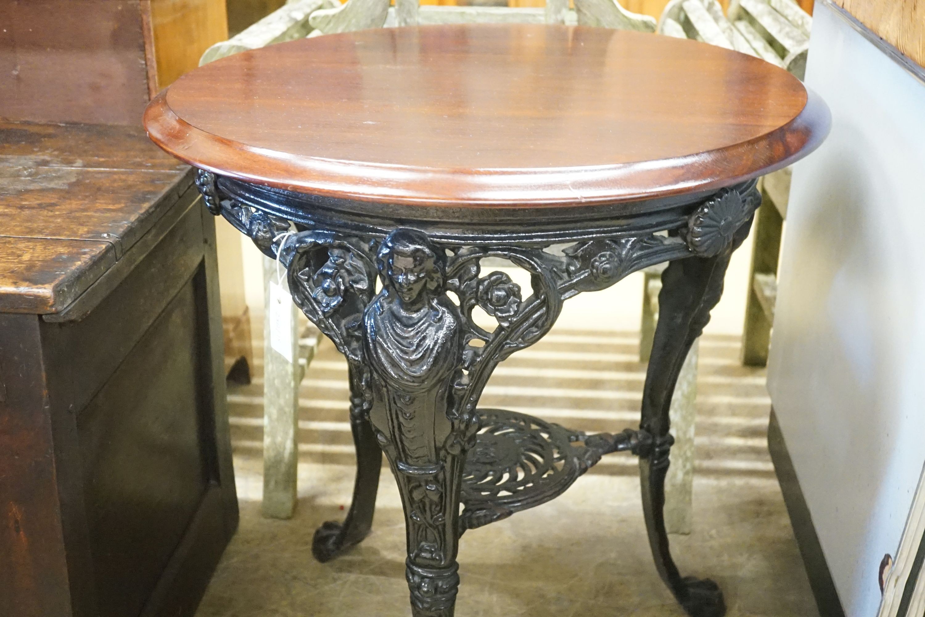 A Victorian painted cast iron pub table, diameter 68cm height 72cm